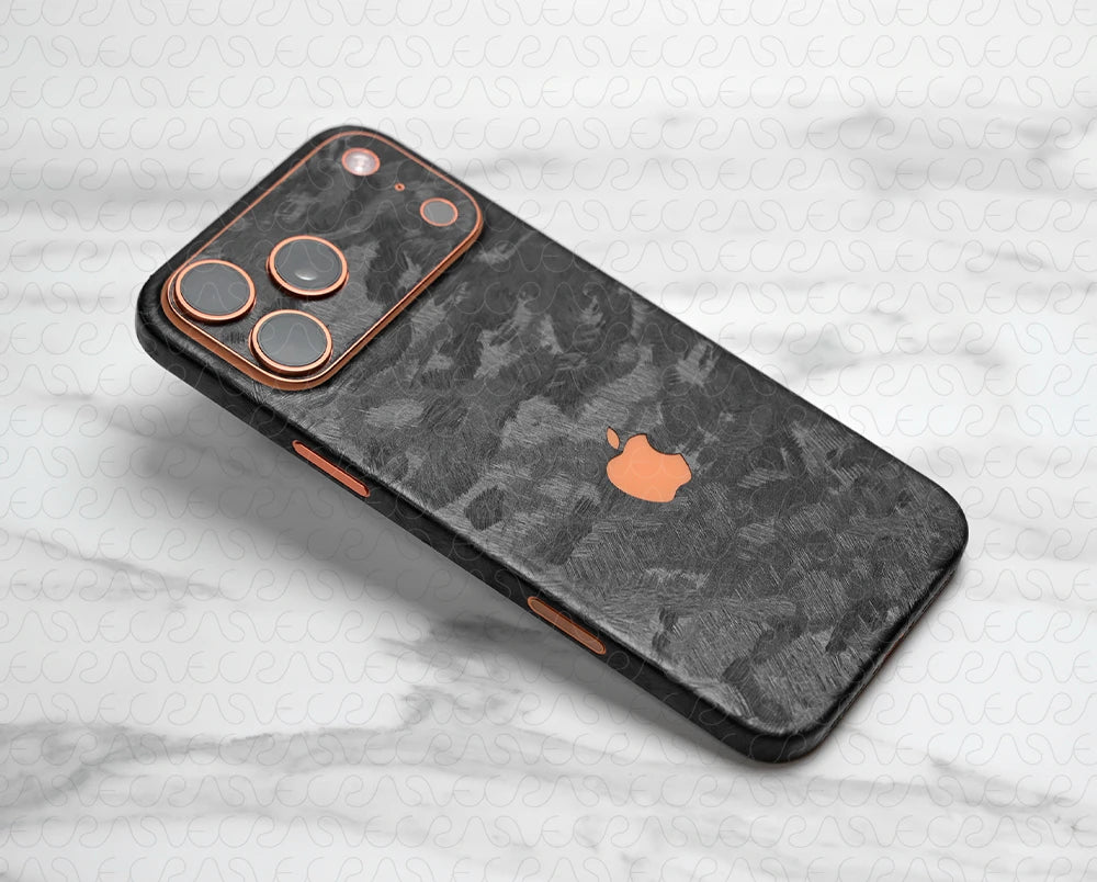 Phone case with camouflage pattern and Apple logo on a marble surface