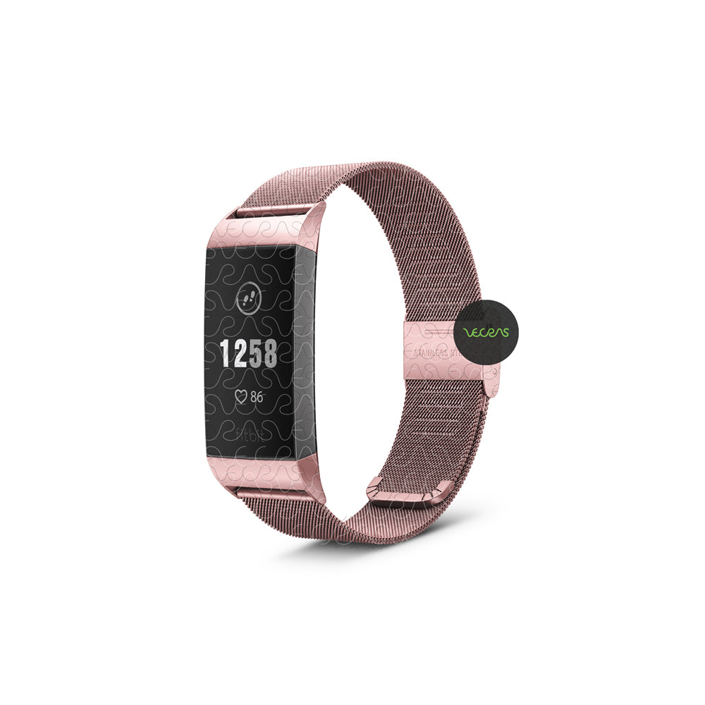 Close-up view of a smartwatch with a patterned rose gold wrist strap and digital clock